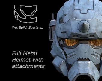 May include: A blue and gray futuristic helmet with a visor and attachments. The helmet has a small horn on top and a textured surface. The text "Full Metal Helmet with attachments" is below the helmet.