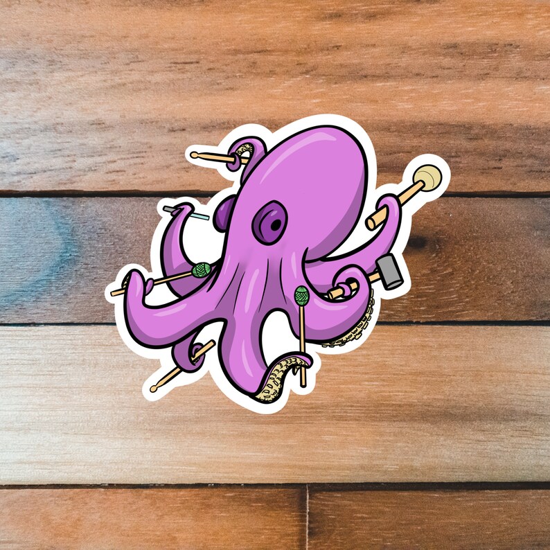 May include: A purple octopus with eight tentacles holding drumsticks and mallets. The octopus is cartoon-style and has a friendly expression.