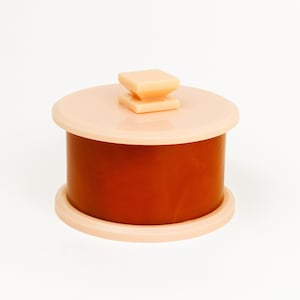 Vintage Art Deco Bakelite & Early Plastic Peach Pink and Red Cylindrical Trinket, Jewellery Box, Square Shape Handle on the Lid