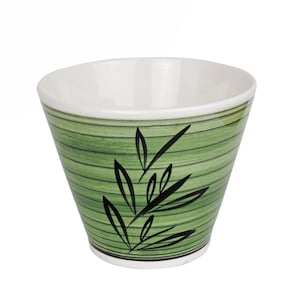 May include: A ceramic bowl with a white interior and a green exterior. The exterior features horizontal green stripes and a black leaf design. The bowl has a tapered shape and is suitable for serving food.