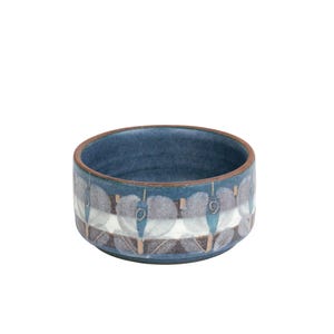 May include: A set of three ceramic mugs with a speckled, matte finish. The mugs are in shades of cream, light gray, and dark gray. Each mug has a simple, minimalist design, perfect for coffee or tea.