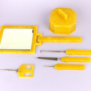 6 Piece German Yellow Early Plastic Vanity Dressing Table Set, Lidded Box, Hand Mirror, Manicure Tools, 1930s, Early 20th Century, Celluloid