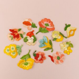 Collection of 12 Vintage Embroidered Flower Appliques in Peach Pink and Yellow, Silk Floral image 1