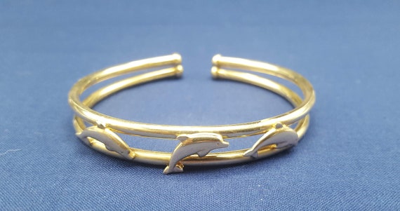 14kt gold dolphin cuff bracelet - image 1