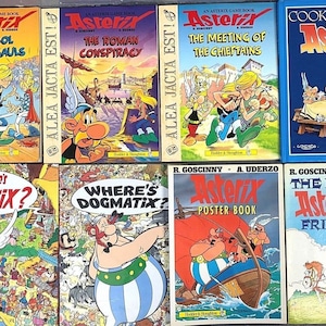 May include: A collection of eight Asterix comic books, including "The Idol of the Gauls", "The Roman Conspiracy", "The Meeting of the Chieftains", "Cooking with Asterix", "Where's Asterix?", "Where's Dogmatix?", "Asterix Poster Book", and "The First Asterix Frieze".