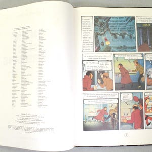 May include: An open book featuring comic strip panels and text in French. The panels depict a story with characters in coats and hats. The left page lists names. The right page has a comic strip with the words "MUSEE OCEANCO".