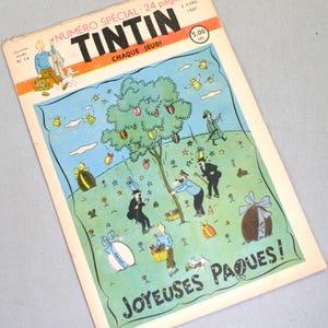 Puede incluir: Una portada de c&oacute;mic vintage de Tint&iacute;n del 3 de abril de 1947, titulada Num&eacute;ro Sp&eacute;cial: 24 pages Tintin. La ilustraci&oacute;n muestra personajes en un campo verde con un &aacute;rbol que tiene huevos coloridos y el texto Joyeuses P&acirc;ques! en la parte inferior.