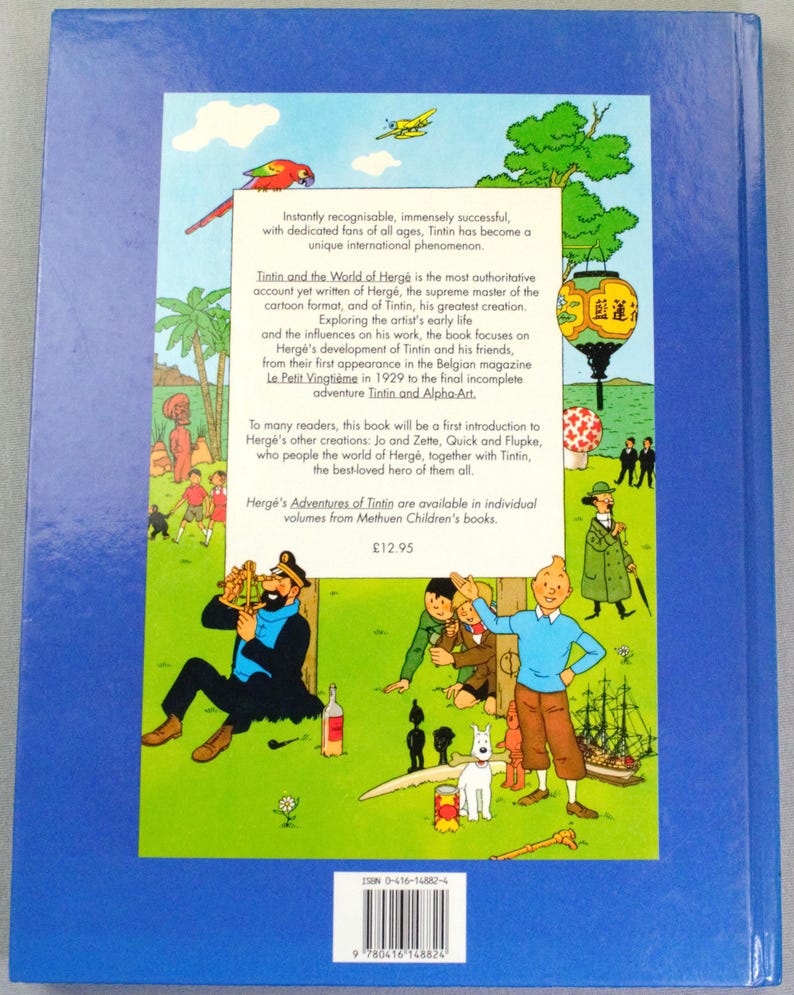 Puede incluir: La contraportada de un libro titulado "Tint&iacute;n y el Mundo de Herg&eacute;" presenta ilustraciones coloridas de Tint&iacute;n y otros personajes. La portada incluye texto que describe el contenido del libro y las aventuras de Tint&iacute;n. Es un libro infantil.