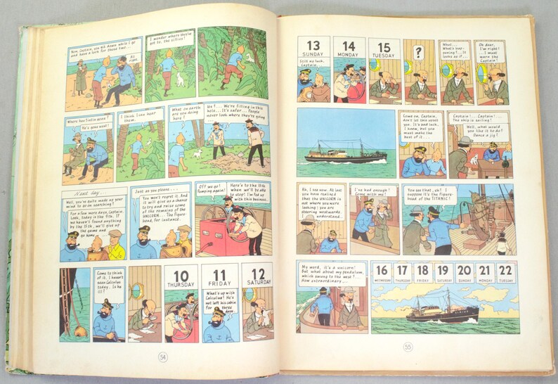 May include: Open book with comic strip illustrations. The pages feature panels with sequential art, including characters in various scenes. Numbers 10-22 are visible, along with the days of the week. The artwork is colorful and detailed.