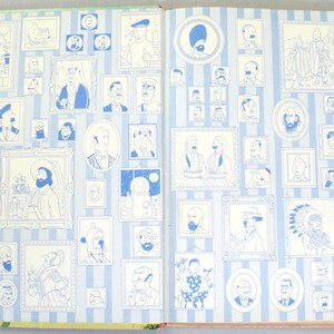May include: Open book pages with numerous blue and white illustrations of portraits and figures. The images are framed and arranged on a striped background. The illustrations vary in size and style, creating a visually engaging layout.