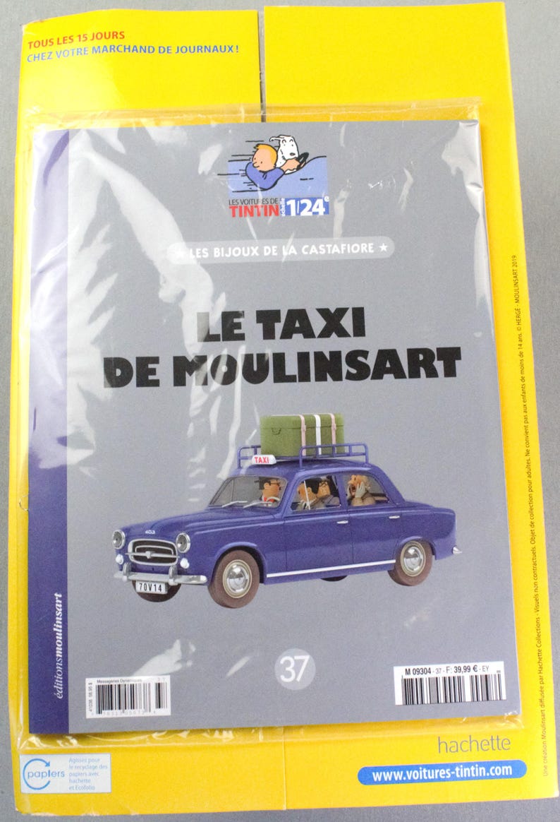 May include: A packaged collectible featuring a blue car with luggage on top, labeled "LE TAXI DE MOULINSART." The cover includes the text "LES BIJOUX DE LA CASTAFIORE" and "TINTIN 1/24." The packaging is yellow with French text.