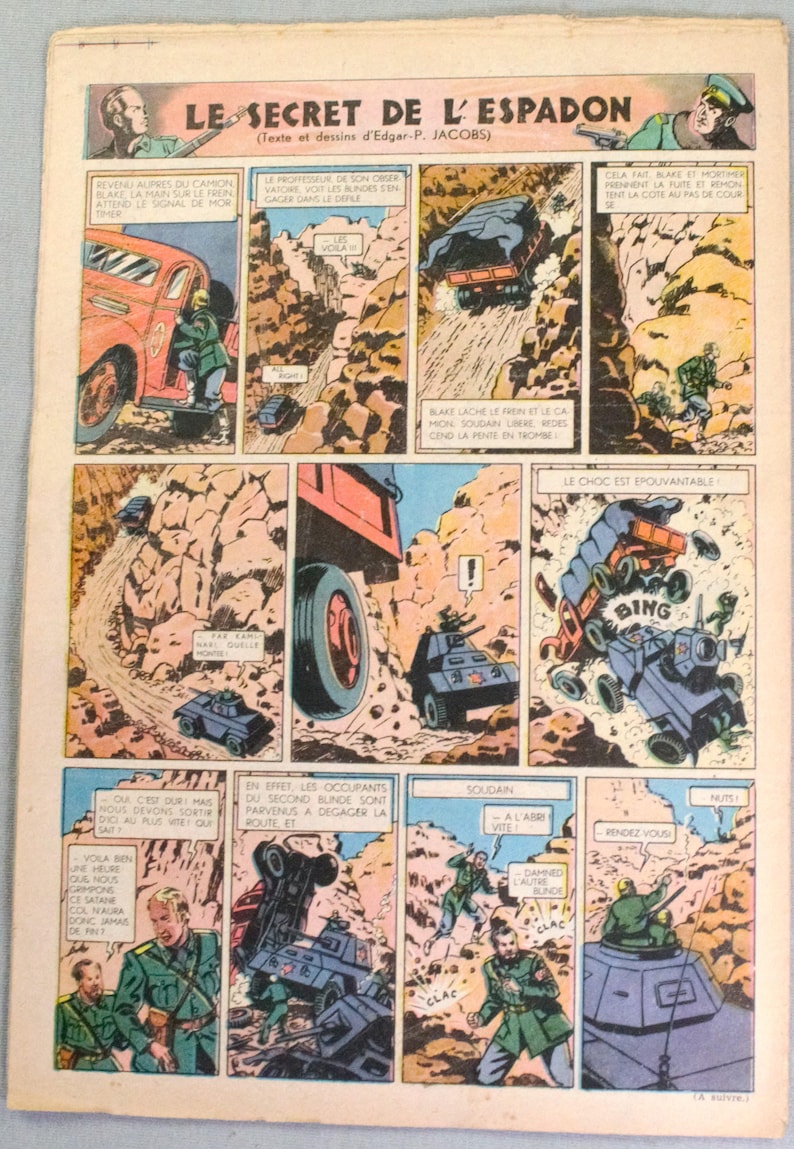 Puede incluir: Una p&aacute;gina de c&oacute;mic vintage titulada Le Secret de l'Espadon de Edgar P. Jacobs, con paneles coloridos de acci&oacute;n militar, veh&iacute;culos blindados y soldados con uniformes verdes en un paso de monta&ntilde;a con texto en franc&eacute;s.