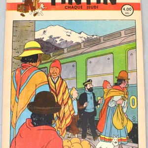 K&ouml;nnte beinhalten: Ein altes Tintin-Comic-Cover vom 13. M&auml;rz 1947 mit einer farbigen Illustration von Tim, Kapit&auml;n Haddock und Struppi vor einem gr&uuml;nen Zug, begleitet von Personen in traditioneller andiner Kleidung und einem Korb voller Orangen.