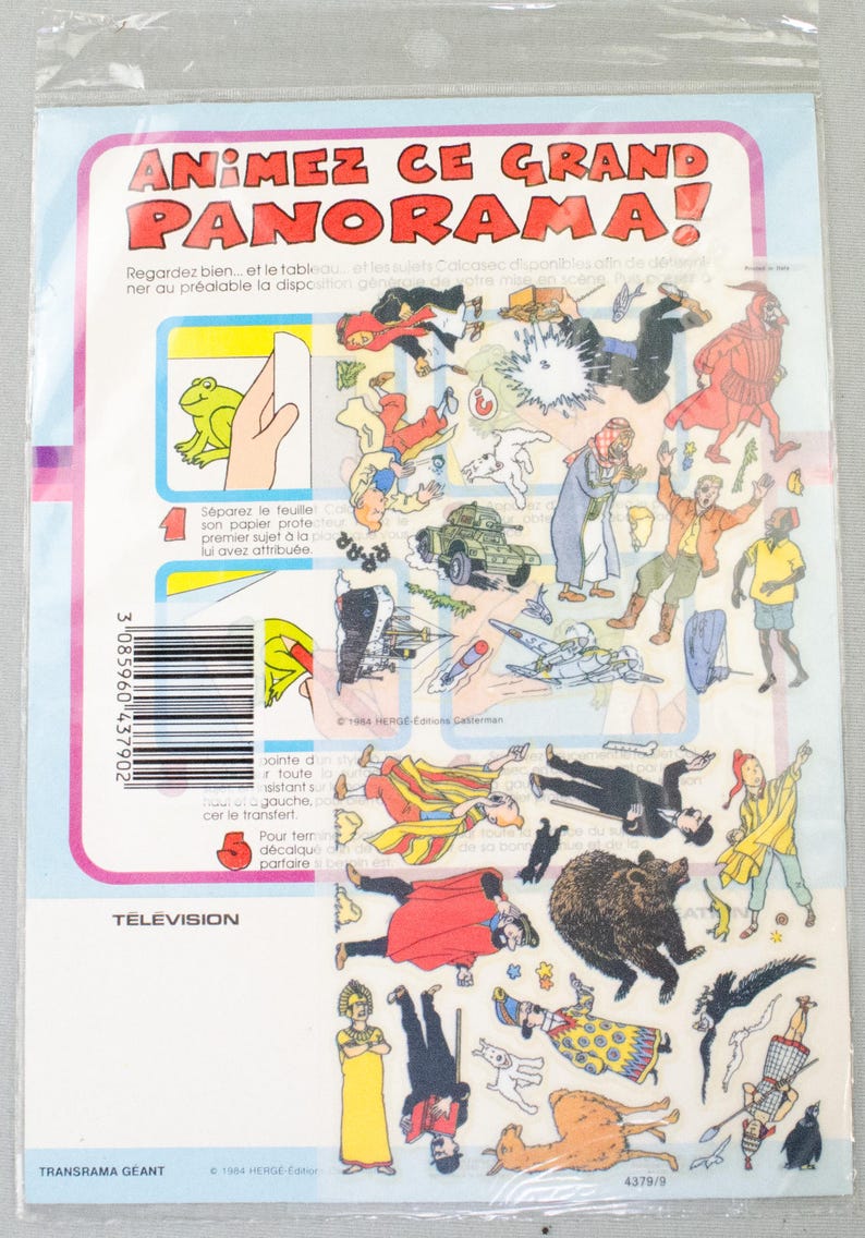 K&ouml;nnte beinhalten: Ein Bogen mit Cartoon-Charakter-Abziehbildern mit dem Text "ANIMEZ CE GRAND PANORAMA!". Der Bogen enth&auml;lt verschiedene Figuren, einen Frosch, einen B&auml;ren und einen Panzer.