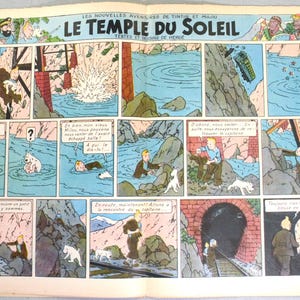 Puede incluir: Una p&aacute;gina de c&oacute;mic vintage titulada Les Nouvelles Aventures de Tintin et Milou Le Temple du Soleil de Herg&eacute;. La p&aacute;gina presenta m&uacute;ltiples paneles coloridos que representan a Tint&iacute;n y su perro Mil&uacute; navegando por un r&iacute;o y v&iacute;as de tren.