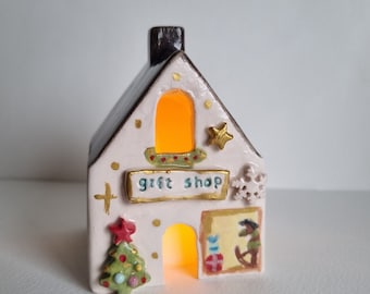 Portacandele natalizio in ceramica fatto a mano: decorazione rustica per le feste