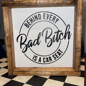 Home Behind Every Bad B!tch Is A Car Seat Sign