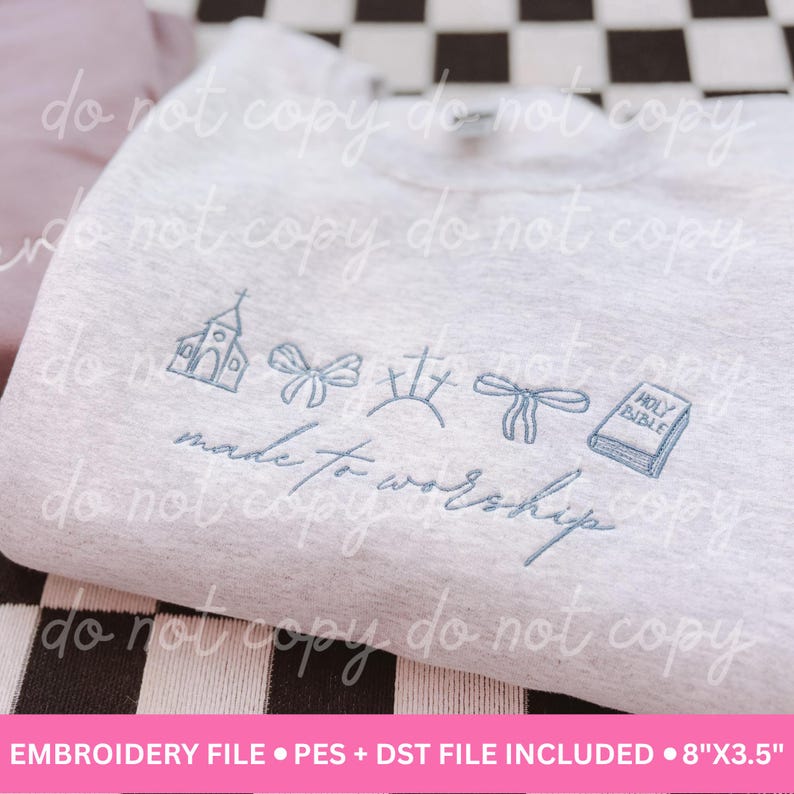 May include: A light gray sweatshirt with embroidered light blue religious symbols, including a church, bows, a cross, and a book. The words "made to worship" are embroidered below the symbols. The embroidery file is 8"x3.5".