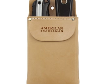 May include: A tan leather utility belt pouch with the text "AMERICAN TRADESMAN" embossed on the front. The pouch has two slots for holding tools, one of which is holding a silver and black utility knife.