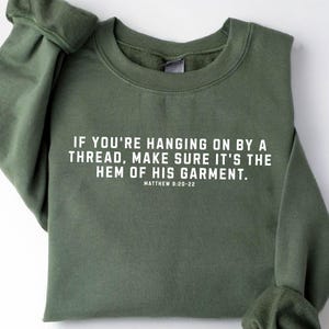 Bible Verse Sweatshirt: "Hanging On By A Thread" Faith Shirt