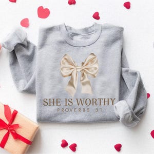 Christian Shirt,
Best Religion Tshirt,
Coquette Bow Shirt,
bible shirt,
bible verse shirt,
religious shirt,
faith shirt,
she is worthy shirt,
womens tshirts fall,
Women's Christian,
Christian Coquette,
Girly Faith Shirt,
Christian Bow Shirt