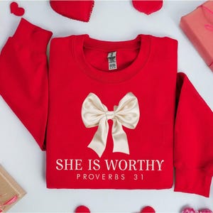 Christian Shirt,
Best Religion Tshirt,
Coquette Bow Shirt,
bible shirt,
bible verse shirt,
religious shirt,
faith shirt,
she is worthy shirt,
womens tshirts fall,
Women's Christian,
Christian Coquette,
Girly Faith Shirt,
Christian Bow Shirt