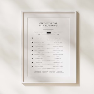 May include: Black and white printable bathroom word puzzle with the title "On the Throne with No Phone?"  The puzzle is a list of words and their corresponding answers.  For example, "Minutes and hours" is the answer to "Time".