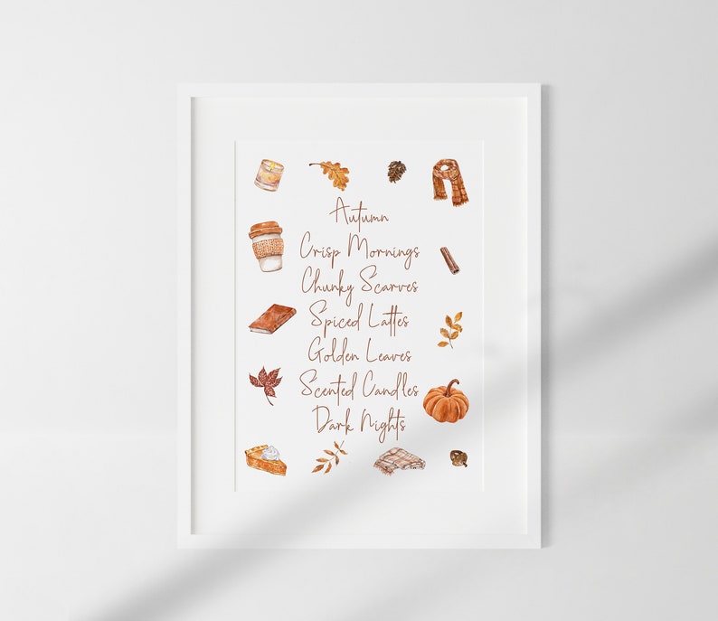 May include: A watercolor illustration of autumn with the words "Autumn, Crisp Mornings, Chunky Scarves, Spiced Lattes, Golden Leaves, Scented Candles, Dark Nights". The illustration includes a cup of coffee, a scarf, a book, a pumpkin, a pie, and leaves.