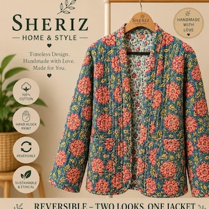 May include: A reversible quilted jacket featuring a teal background with a repeating pink floral pattern on one side and a smaller floral print on the interior. The jacket has long sleeves, an open front, and two front patch pockets.