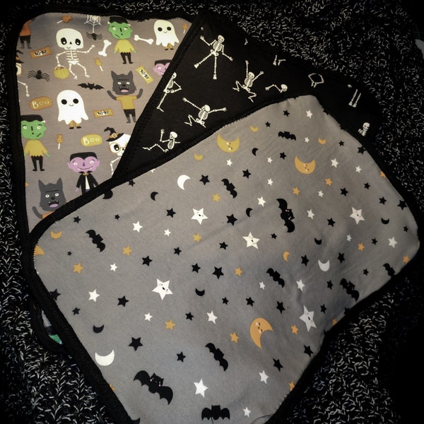 Cute and spooky burp cloth set. Set of 3. 1 dancing skeleton , 1 little monster , and 1 spooky bat confetti