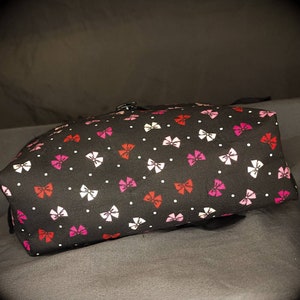 Cute bow bag used for travel, Toiletries, cosmetic storage, skincare   products, medication organization, hair accessory makeup brush holder