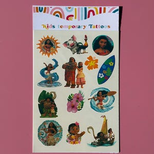 May include: A sheet of temporary tattoos featuring colorful illustrations of characters and elements from a popular animated movie. The sheet includes images of a pig, a rooster, a flower, and characters on a surfboard and boat. The text "Kids temporary tattoos" is at the top.