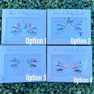 May include: Four packages of face and body jewels are displayed, each featuring a different design. The packages are labeled "Face & Body Jewels" and include options with colorful gem and glitter accents, perfect for festivals or special events.