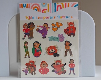May include: A sheet of temporary tattoos featuring cartoon characters and red pandas. The sheet is packaged in a clear plastic sleeve with a colorful background. The text "Kids temporary Tattoos" is printed on the sleeve.