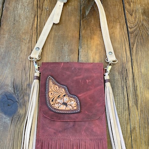 Leather mini purse with fringe and cross body strap