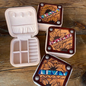 Mini travel jewelry box with tooled leather top