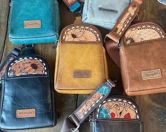 Small sling bags with hand tooled leather patches
