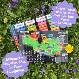 May include: Two event maps on grass with purple and yellow flowers. One map features a detailed venue layout with stage names and icons. The other map displays a custom lineup with set times and locations. Text on the map reads "Enlarged + Simplified Map for Easy Navigation."