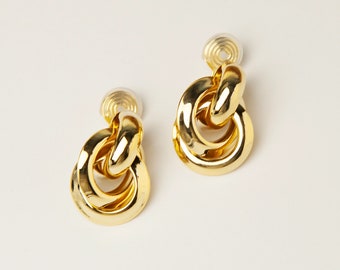 Boucles d'oreilles à clip avec noeud doré, grand cercle torsadé sur les clous, boucles d'oreilles non percées en métal doré minimalistes, boucles d'oreilles modernes simples