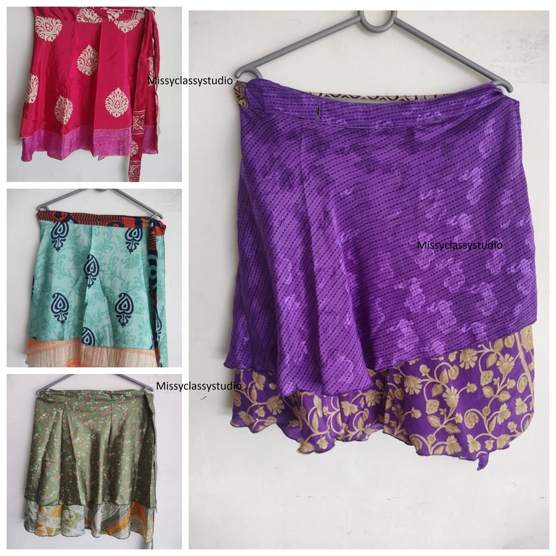 Pode incluir: Tr&ecirc;s estilos diferentes de saias de enrolar feitas com saris reciclados. As saias s&atilde;o de v&aacute;rias cores e padr&otilde;es, incluindo rosa, verde e roxo. Todas as saias s&atilde;o amarradas na cintura e t&ecirc;m um visual fluido e em camadas.
