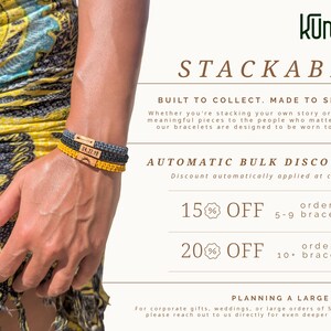 May include: Three braided cord bracelets in gray, black, and yellow, each featuring a rectangular wooden charm. The top charm displays an arrow, the middle charm shows the date 04.27.98, and the bottom charm depicts a sun icon.