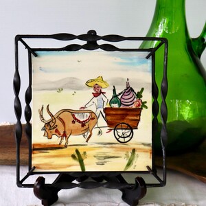 Hand-painted folk art tiles in black wrought iron frames: choice of three designs