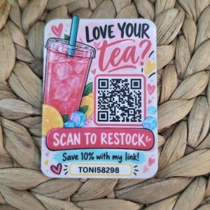 May include: A rectangular sticker featuring a pink iced tea drink with a blue straw, lemon slices, and ice cubes. It includes the text LOVE YOUR TEA?, a QR code, a SCAN TO RESTOCK button, and the text Save 10% with my link! TONI58298.