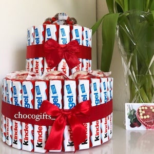 Kinderriegel Maxi cake for birthdays or Mother&#39;s Day. Birthday gift made of edible chocolate.