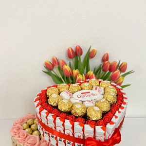 Birthday gift or gift for special occasion baptism consists of kinderriegel and Rocher Ferrero & rafellos