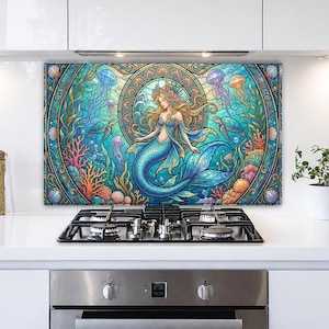 May include: A rectangular kitchen backsplash panel featuring a vibrant, stained-glass style illustration of a mermaid surrounded by jellyfish, sea turtles, and coral reefs in shades of blue, teal, orange, and pink, set within a circular frame.