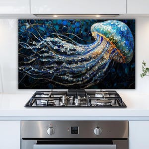 May include: A colourful artistic representation of a jellyfish in shades of blue, gold, and white. The artwork has intricate details and a dark background, creating a striking visual effect. The jellyfish appears to be floating in water.