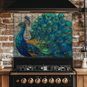 Vibrant peacock stained-glass backsplash in shades of teal and blue, mounted behind a professional black gas range in a rustic kitchen with exposed brick walls and wooden countertops.