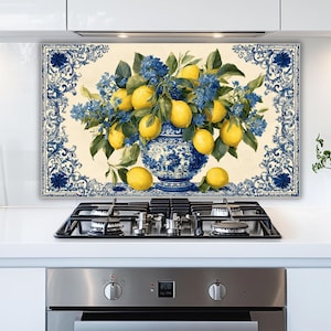 May include: A rectangular kitchen splashback featuring a still life of lemons and blue flowers in a blue and white vase. The artwork has a decorative blue border and is set against a cream background.
