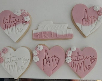 Hen party .bridal shower .wedding biscuits .team bride biscuits personalised biscuits.hen do cookies marriage gifts